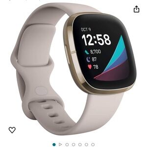 Fitbit sense, gold with lunar bracelet.  Mint condition, like new